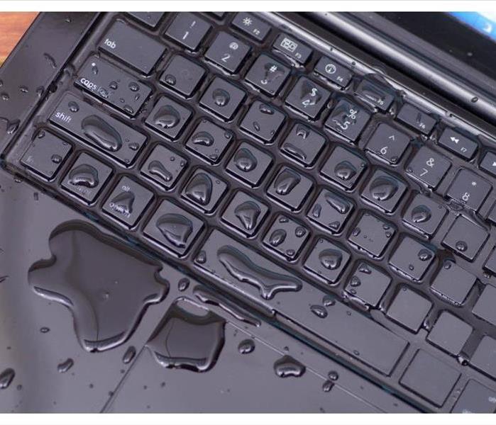 Spilled water on computer keyboard